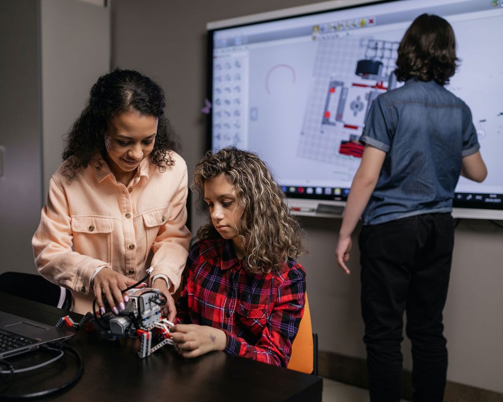 robotics students using a smartboard