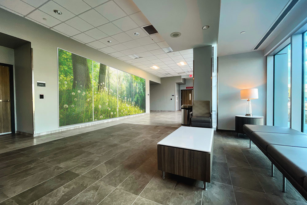 custom printed whiteboard in a hospital lobby